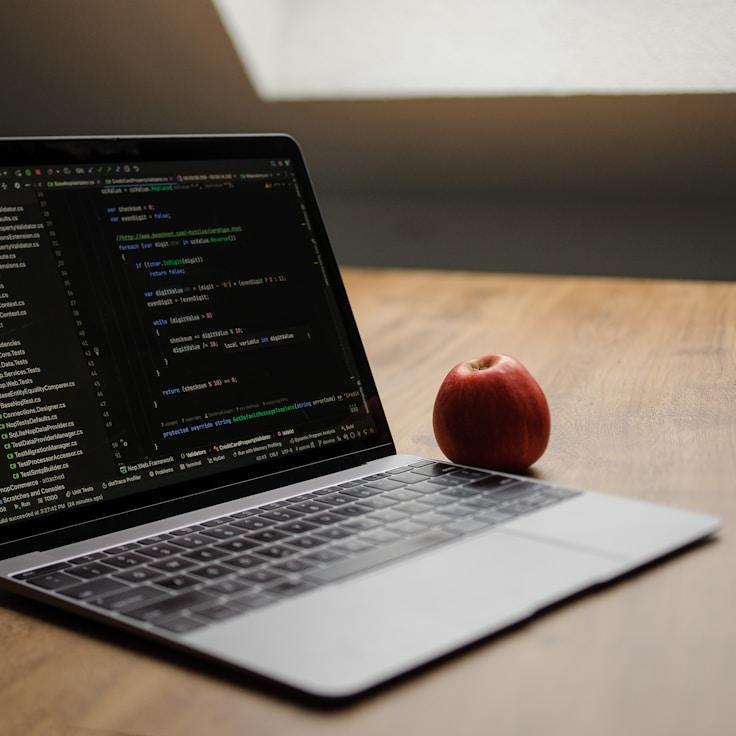 Mobile app project planning workspace with devices and development tools